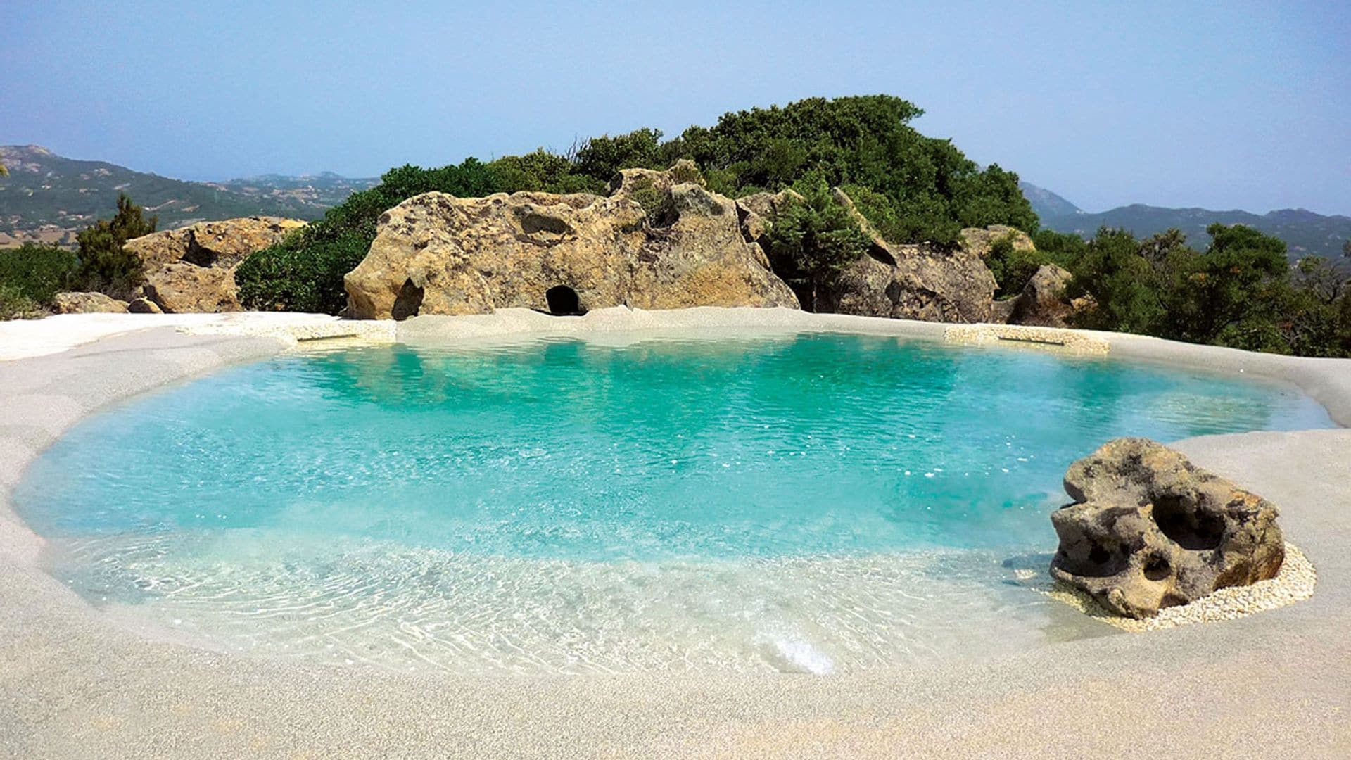 Piscinas de arena: ¿Quieres recrear la playa en tu propia casa?