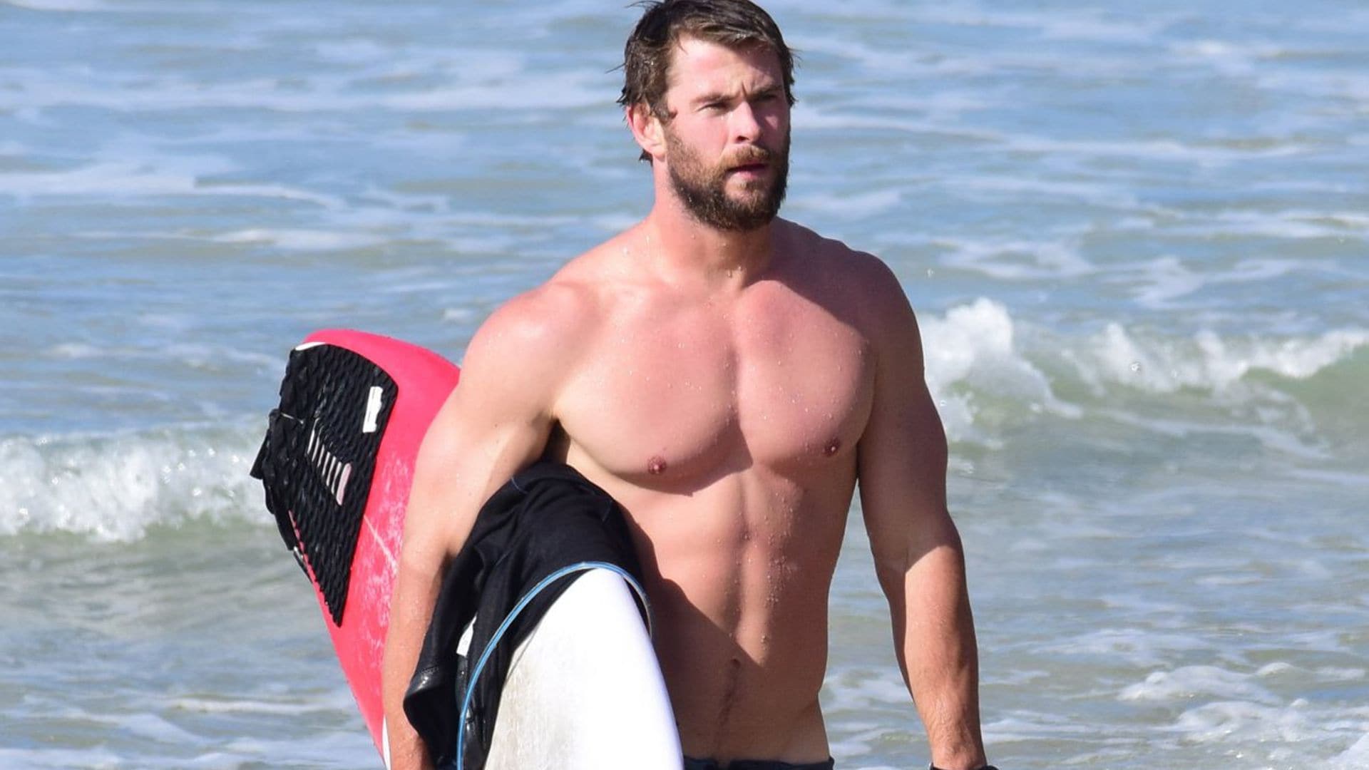 chris hemsworth surfing