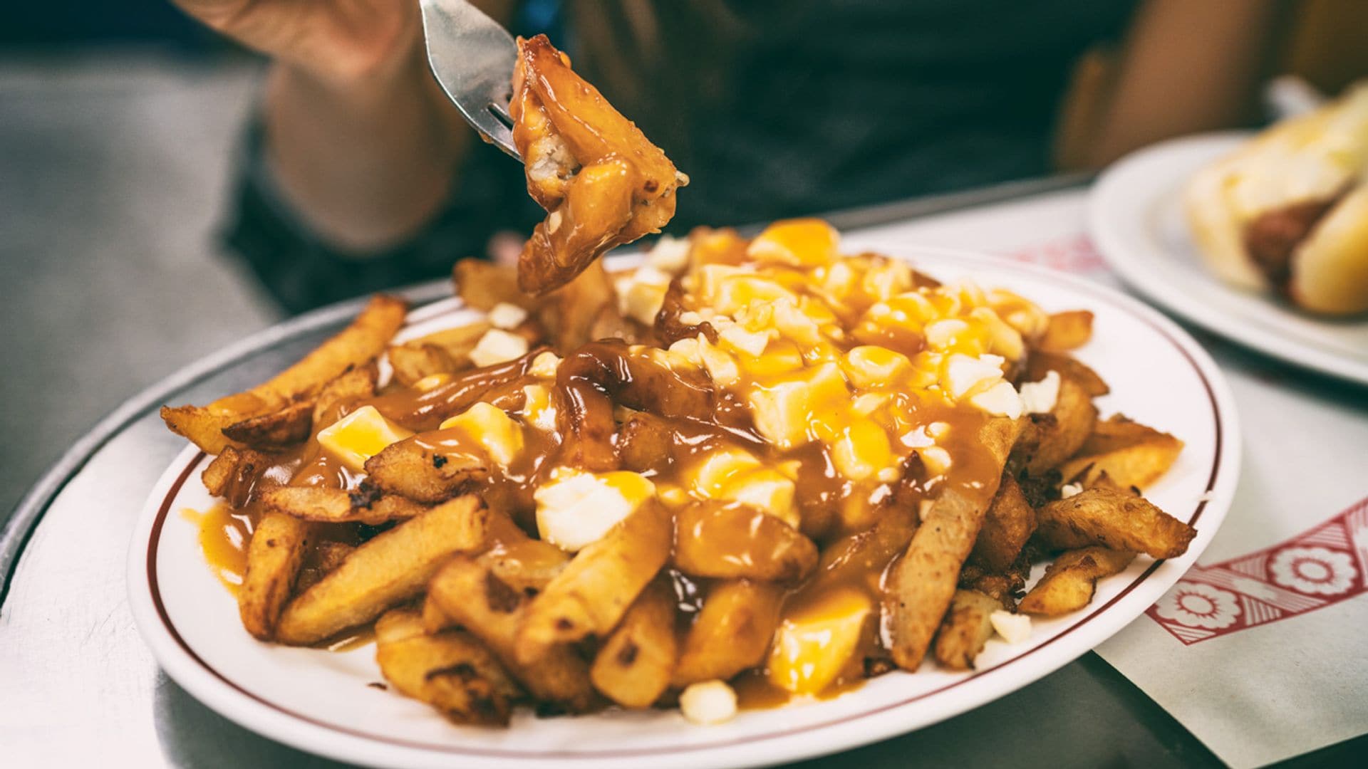 Si no conoces las ‘Patatas Poutine’... ¡serán tu nueva ‘perdición’!