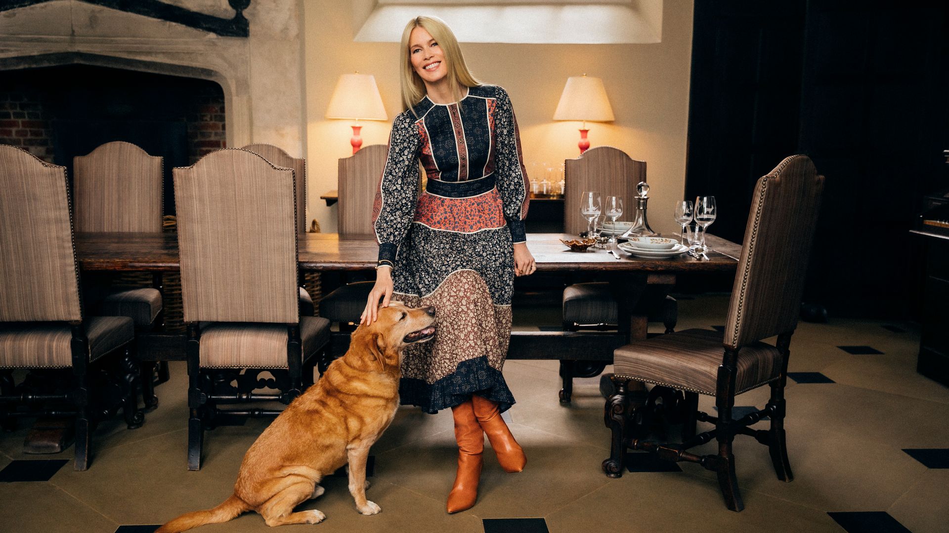 Claudia Schiffer poses in the dining room