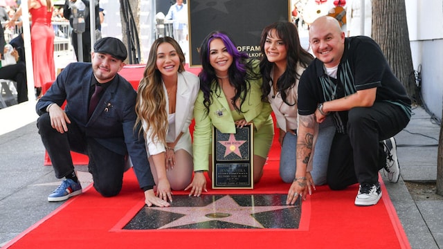 US-Mexican singer songwriter Jenni Rivera's children (L-R) Johnny Lopez, Chiquis Rivera, Jacqie Rivera, Jenicka Lopez and Michael Rivera pose on the star of their late mother during her posthumous Walk of Fame ceremony in front of Capitol Records in Hollywood, California, June 27, 2024. (Photo by VALERIE MACON / AFP) (Photo by VALERIE MACON/AFP via Getty Images)