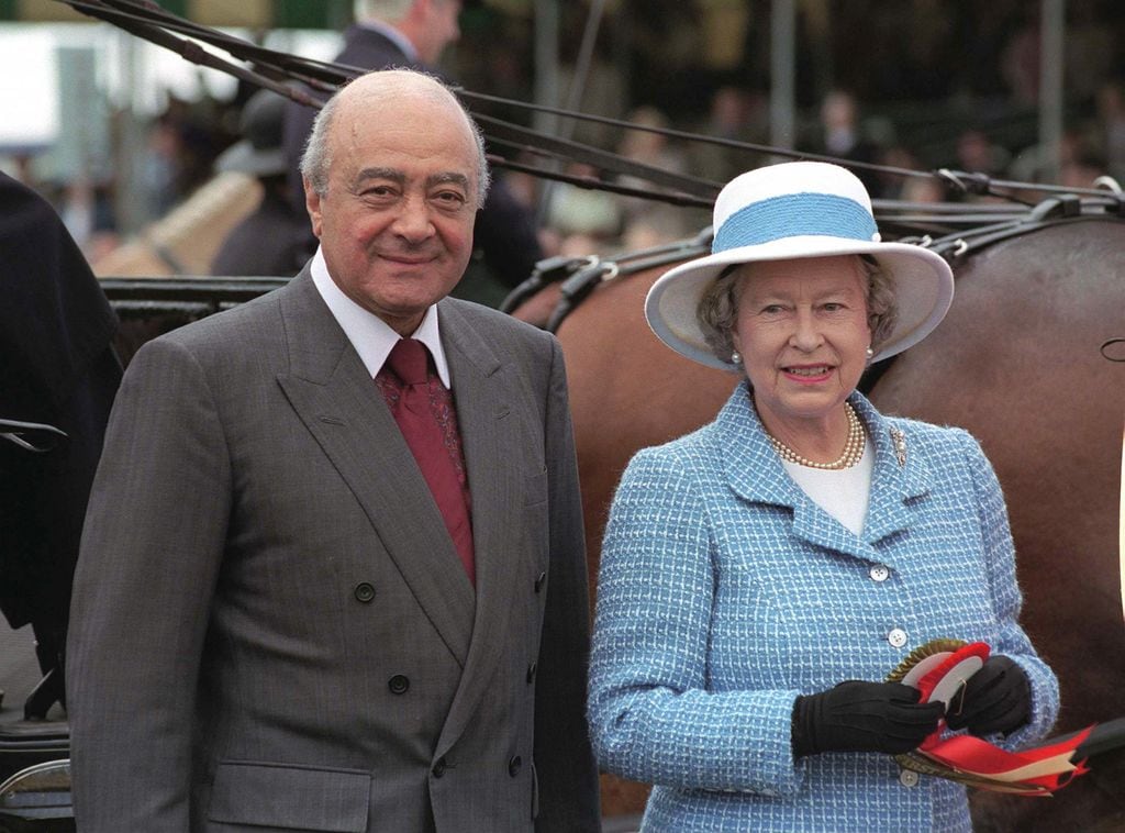 Mohammed Al Fayed e Isabel II, en un evento en mayo de 