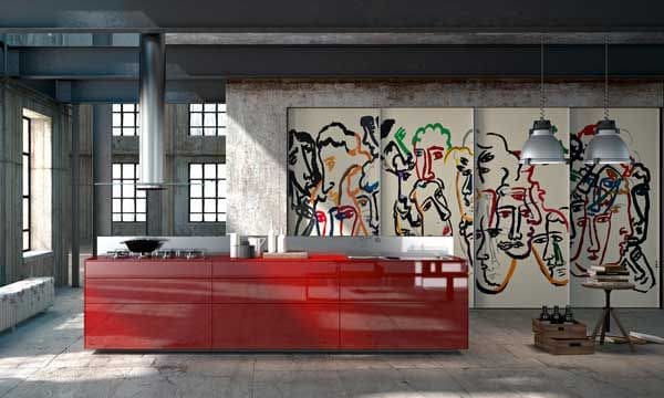 Divertida, original y diferente, esta cocina de Valcucine (valcucine.com) sorprende por su color rojo y por los grafitis que decoran sus armarios.