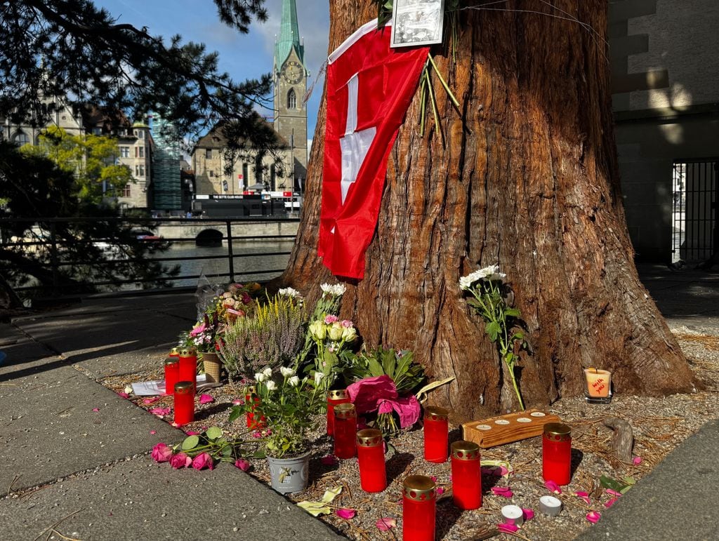 Flowers and candles in memory of Muriel Furrer