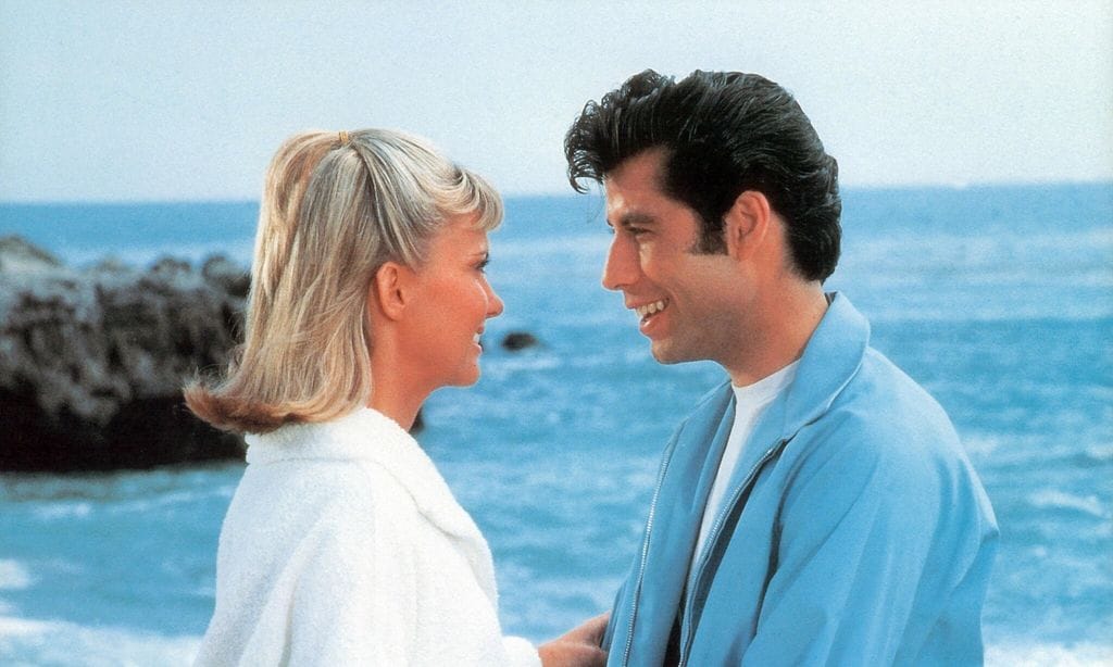 john travolta marks late co star olivia newton john s birthday