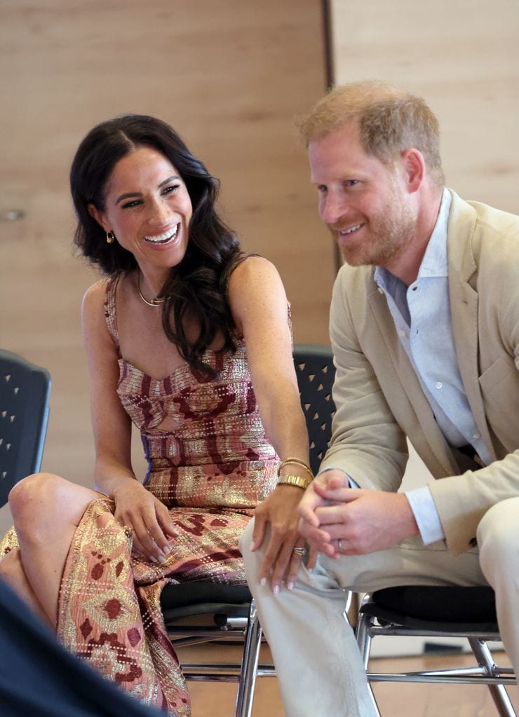 El príncipe Harry, con su mujer Meghan Markle