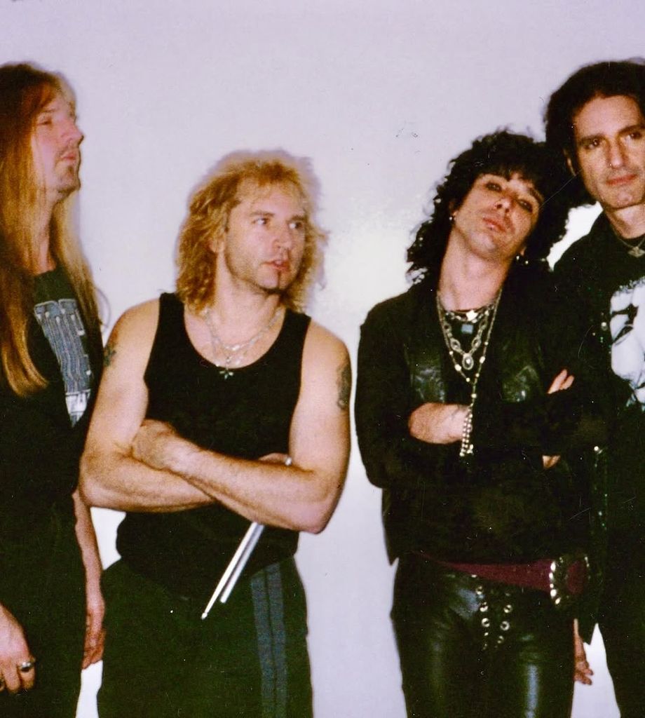 El guitarrista Karl Cochran junto a los integrantes de KISS