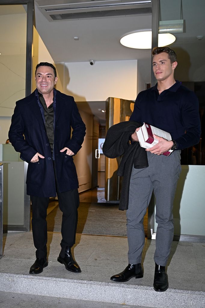 Antonio Rossi y su marido, Hugo Fuertes, a la salida de la presentación del libro de Christian Gálvez, a 22 de noviembre de 2024, en Madrid  