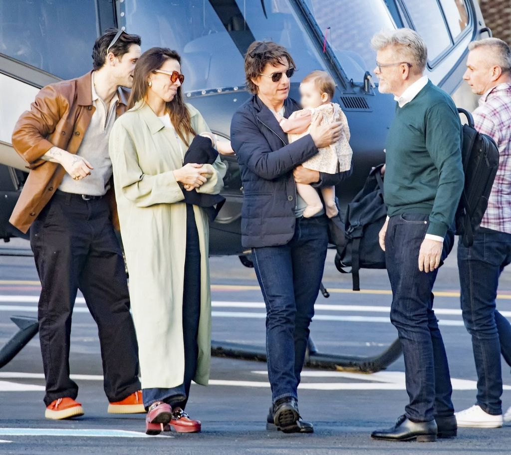 Tom Cruise is captured by loading a baby tenderly