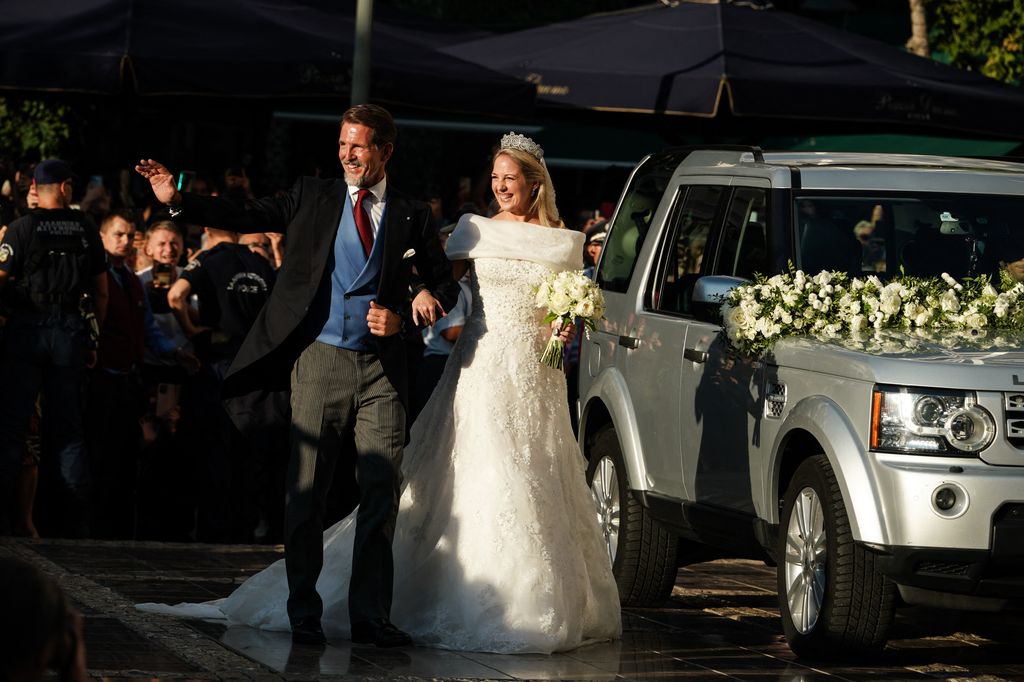 The bride, on the arm of the best man