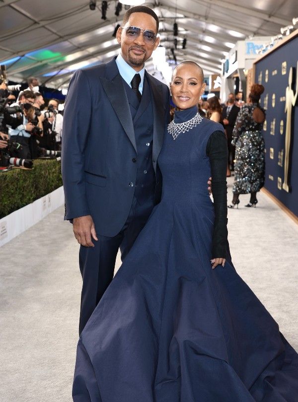 Will y Jada en alfombra