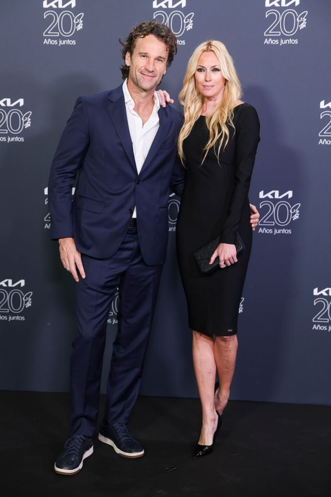 Former tennisplayer Carlos Moya and Carolina Cerezuela at photocall for 20 anniversary of Kia in Madrid on Thursday, 20 March 2025.