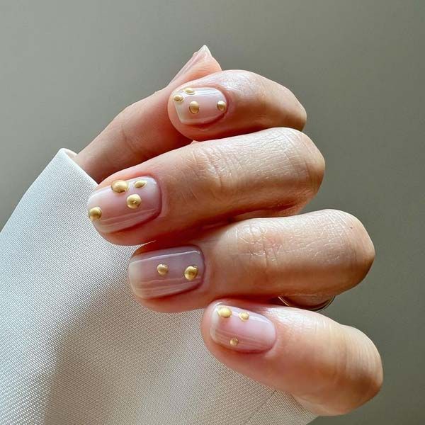 manicura lunares oro