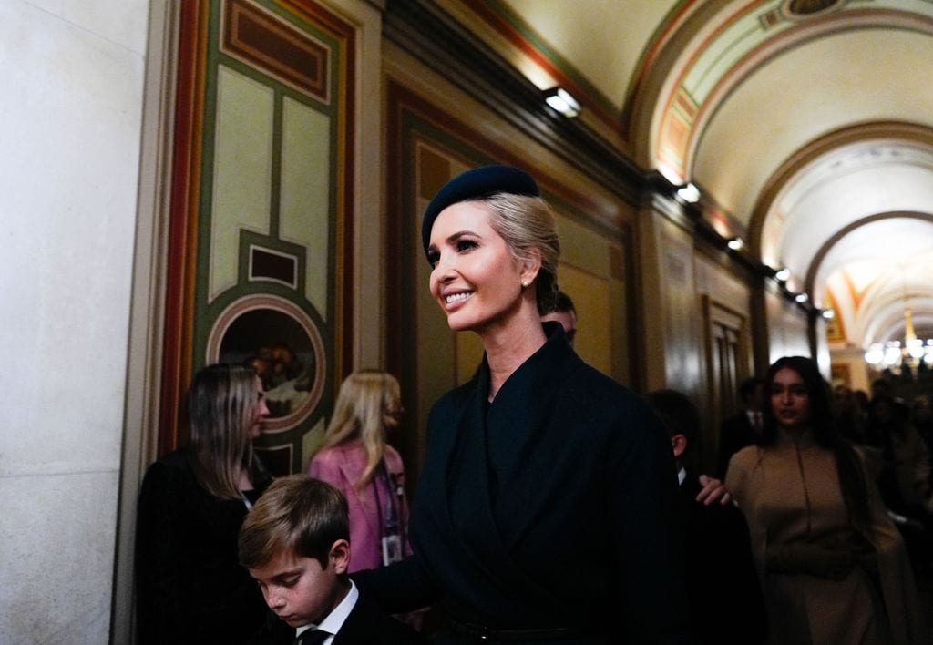 Ivanka Trump arrives at the ceremony with one of her children