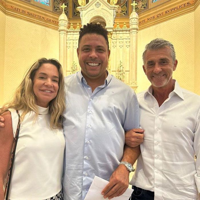 Ronaldo con sus padrinos de bautismo