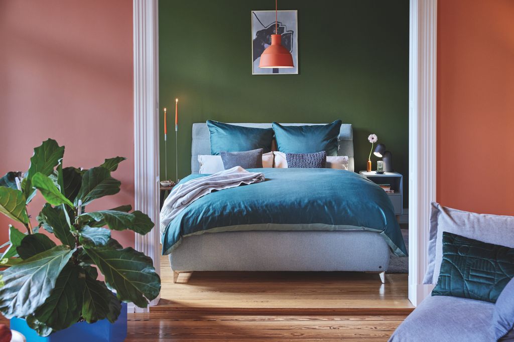 Bedroom with bedding in blue tones