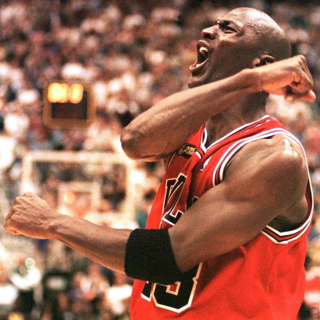 Michael Jordan of the Chicago Bulls celebrates 14