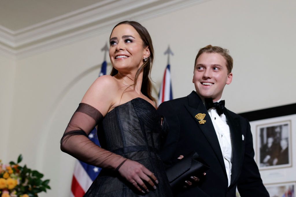 Naomi Biden (L), the granddaughter of US President Joe Biden, and her husband Peter Neal arrive for a State Dinner in honor of Australia's Prime Minister Anthony Albanese and Jodie Haydon, at the Booksellers Room of the White House in Washington, DC on October 25, 2023. (Photo by SAMUEL CORUM / AFP) (Photo by SAMUEL CORUM/AFP via Getty Images)