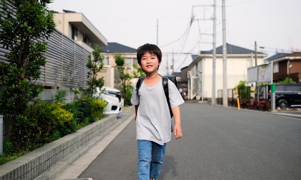 elementary school boy going to school