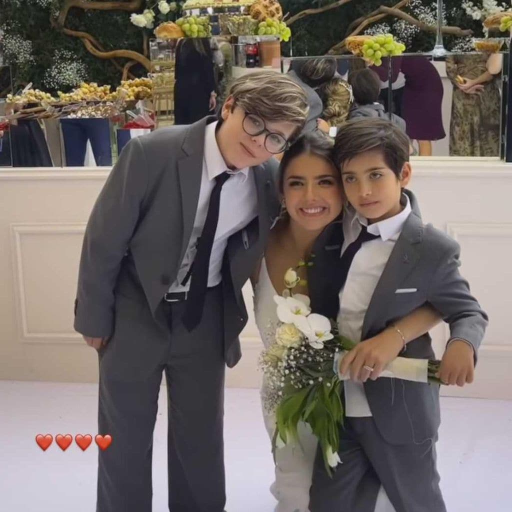 Michelle Renaud con sus hijos