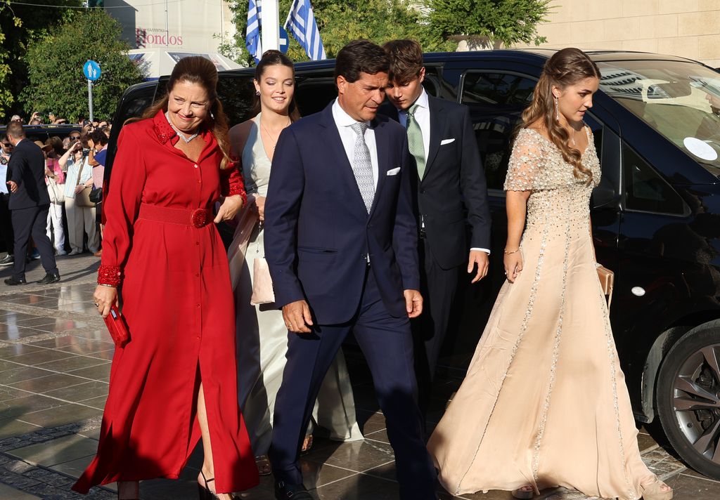 Alexia of Greece and Carlos Morales with three of their four children arrive at the Athens Cathedral to attend the marriage between Theodora of Greece, fourth daughter of King Constantine II of Greece, with Matthew Kumar, on September 28, 2024, in Athens (Greece)