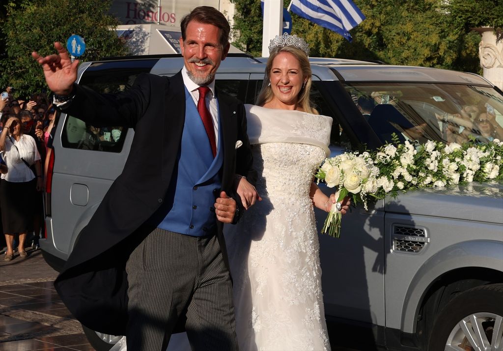 Theodora of Greece with her brother Pablo of Greece arriving at their wedding 