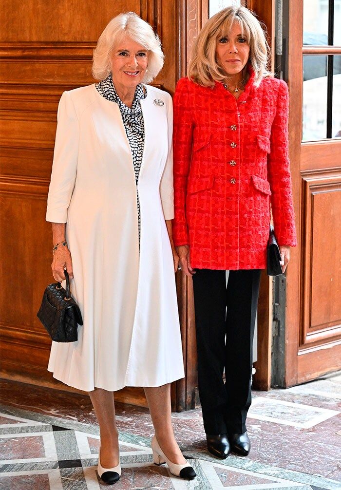 Reina Camilla y Brigitte Macron