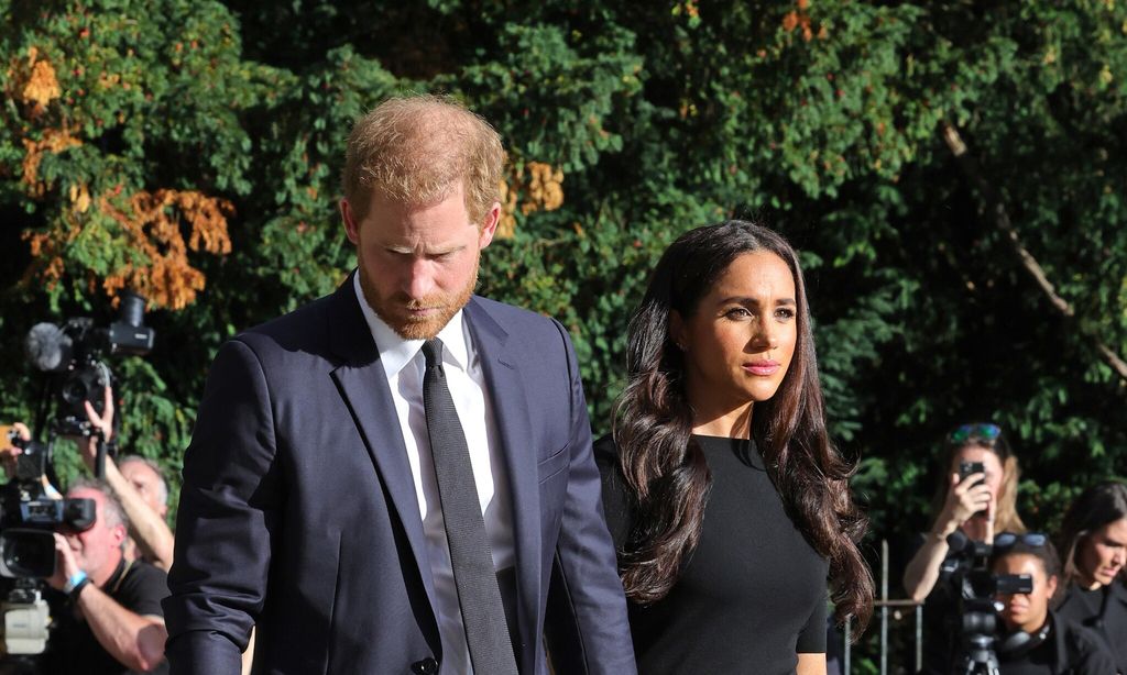 Meghan and Harry were pictured holding hands.