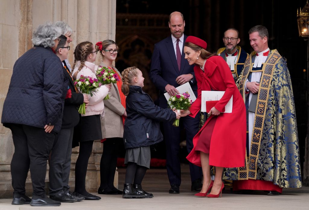 The Princess of Wales is presented with flowers after attending the annual Commonwealth Day Service of Celebration at Westminster Abbey, in London, with the Prince of Wales. Picture date: Monday March 10, 2025. *** Local Caption *** .