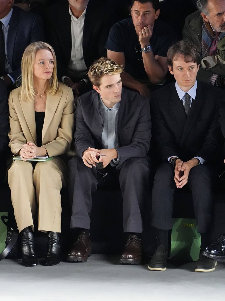 Delphine Arnault, Robert Pattinson y Frederic Arnault