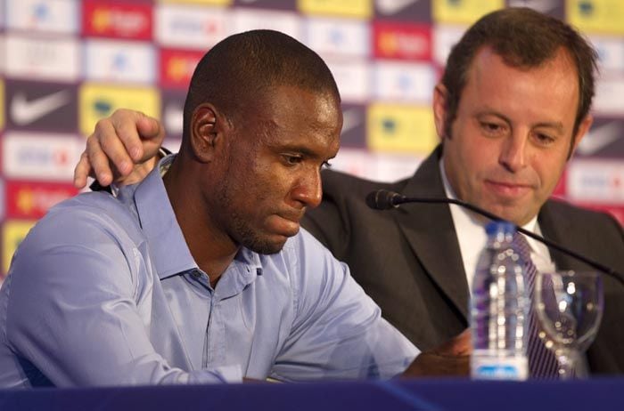 Eric Abidal y Sandro Rosell en 2013