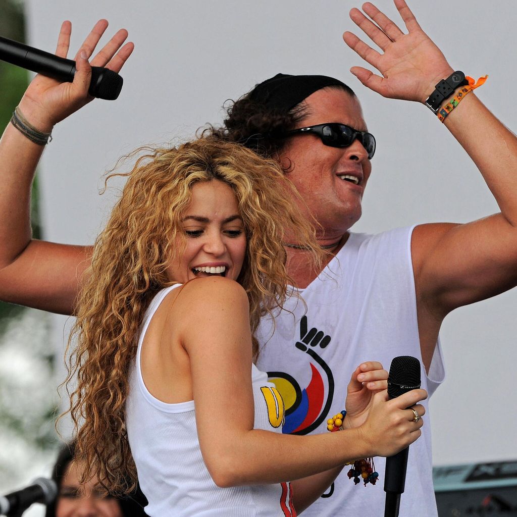 Colombian singers Shakira (L) and Carlos