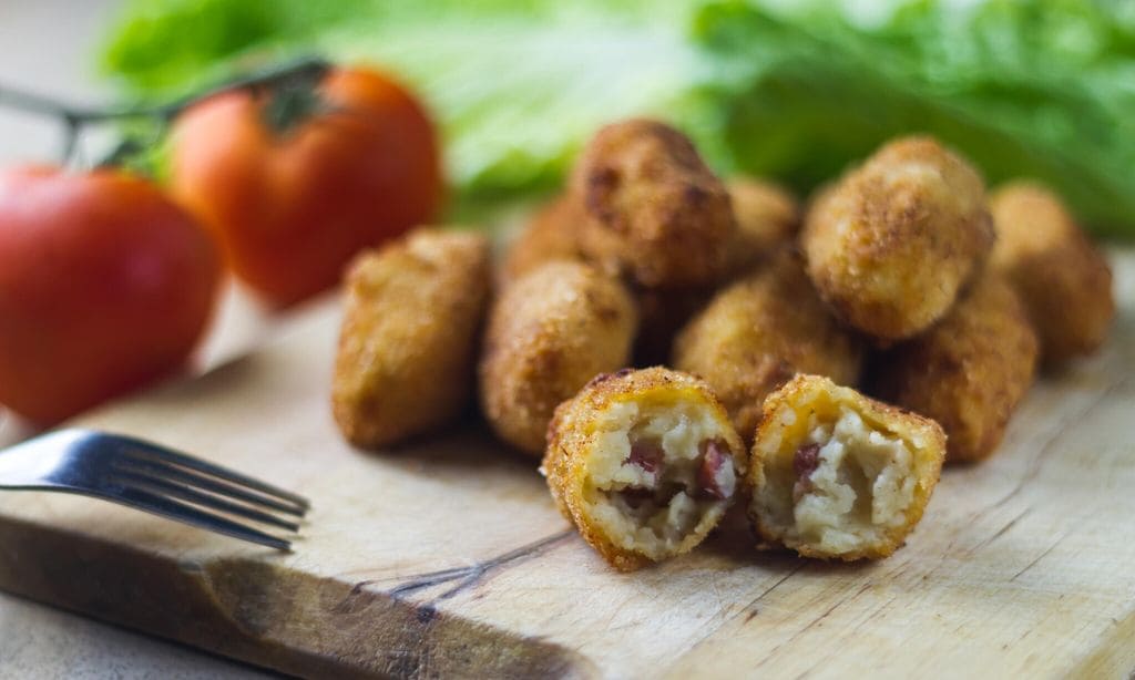 ham croquettes and cooked with vegetables in the background