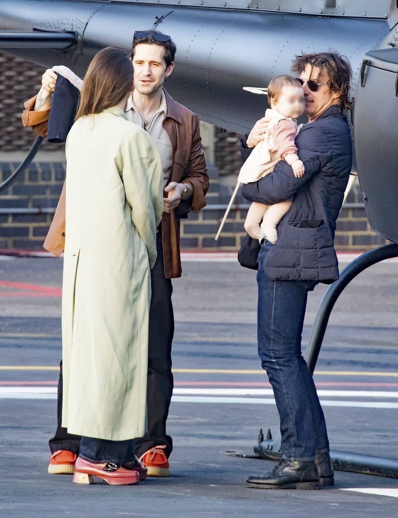 Tom Cruise is captured by loading a baby tenderly