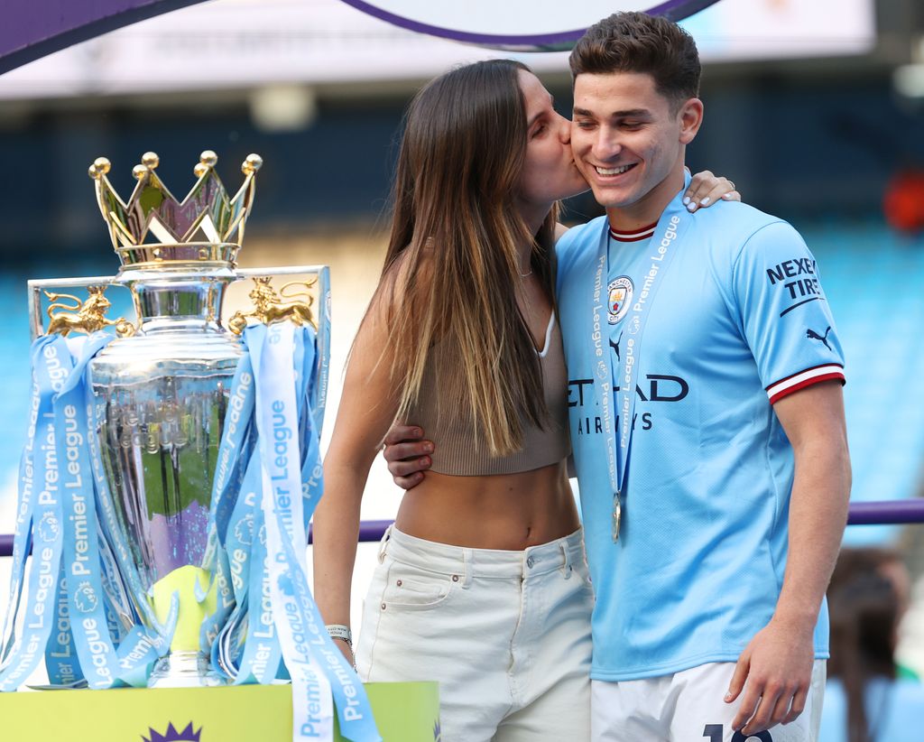 Julian Alvarez of Manchester City celebrates with his girlfriend, Emilia Ferrero during the Premier League match between Manchester City and Chelsea FC at Etihad Stadium on May 21, 2023 in Manchester, United Kingdom