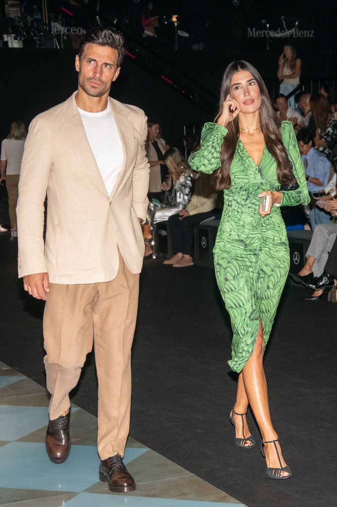 Jaime Astrain y Lidia Torrent posan en el front row del desfile de Pedro del Hierro en la MBFW, a 14 de septiembre de 2023, en Madrid  