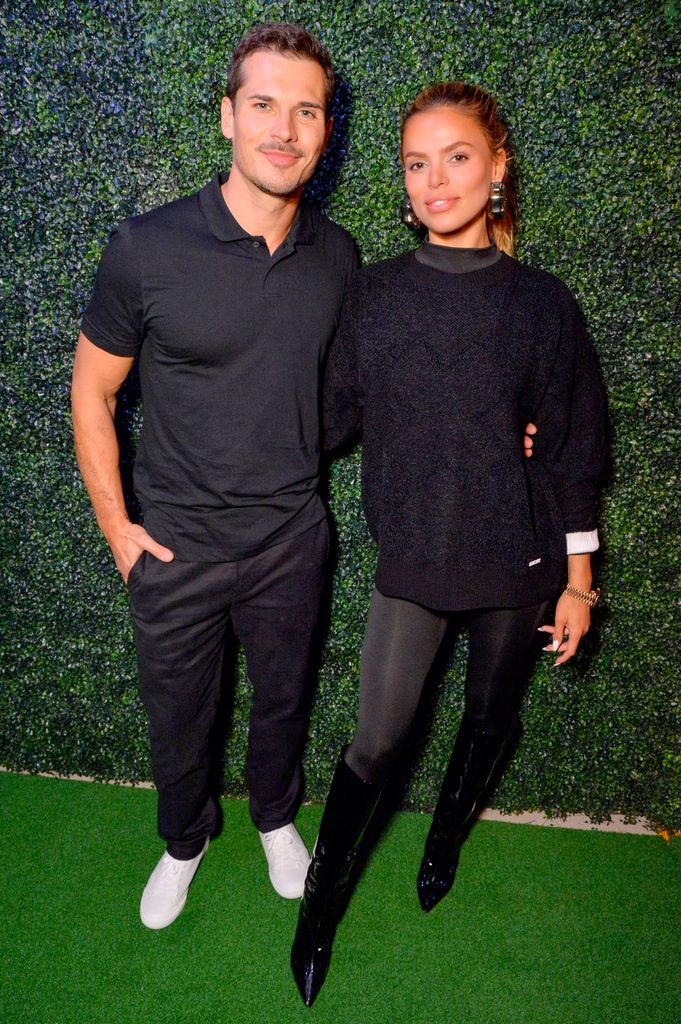 SAN DIEGO, CALIFORNIA - OCTOBER 09: (EDITORS NOTE: This image has been retouched.) (L-R) Gleb Savchenko and Brooks Nader attend the PXG San Diego Grand Opening Celebration on October 09, 2024 in San Diego, California. (Photo by Jerod Harris/Getty Images for PXG)