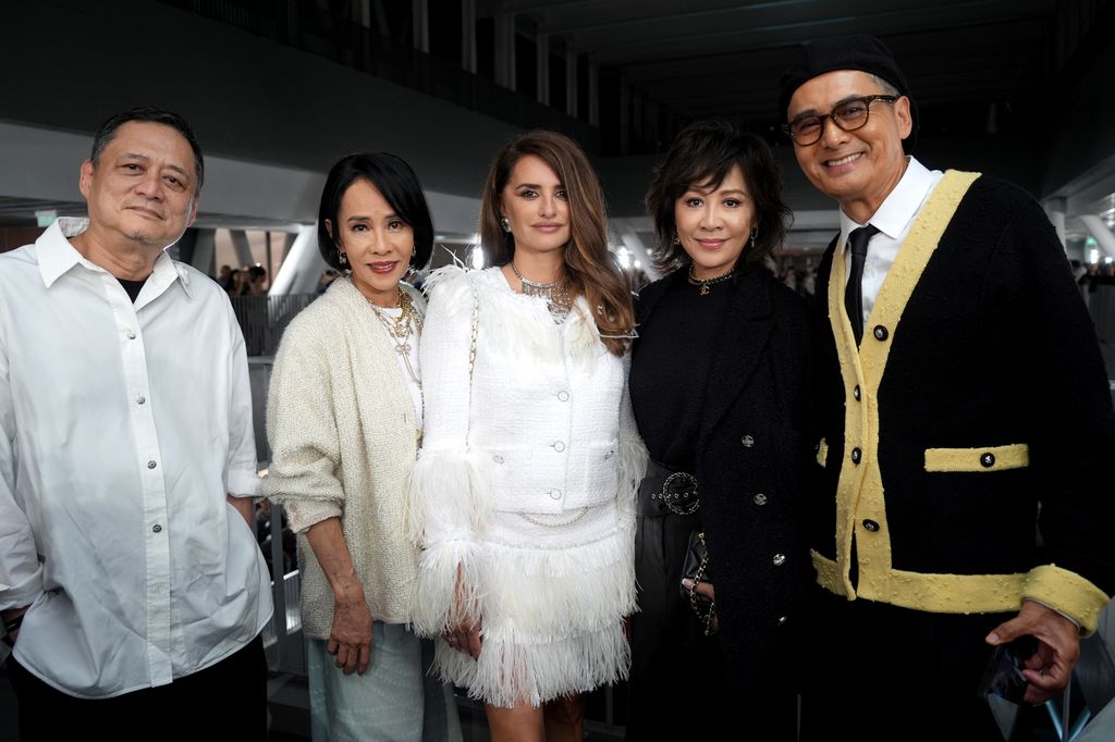 HONG KONG, CHINA - NOVEMBER 05: (L-R) William Chang Suk-Ping, Jasmine Tan, Penelope Cruz, Carina Lau and Chow Yun-fat  attend the CHANEL Cruise 2024/25 Hong Kong Replica evening show at the Hong Kong Design Institute on November 05, 2024 in Hong Kong, China.  (Photo by Anthony Kwan/Getty Images for CHANEL)