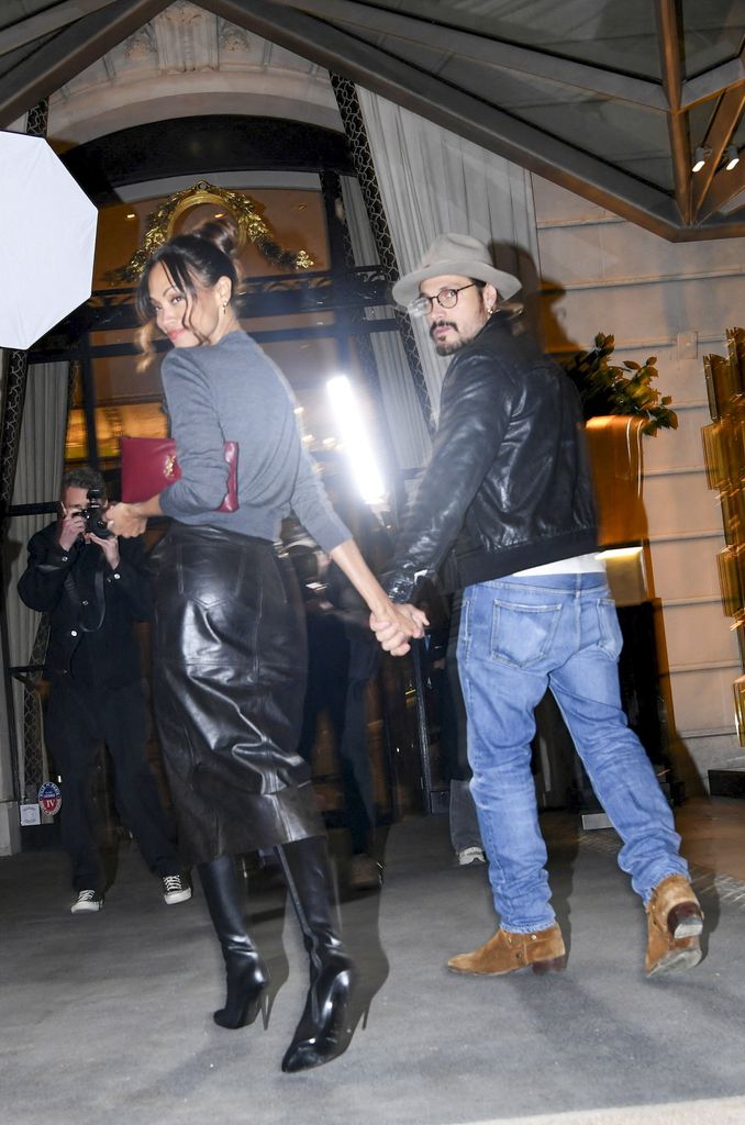 Zoe Saldaña and Marco Perego upon arrival at The Peninsula Paris hotel.