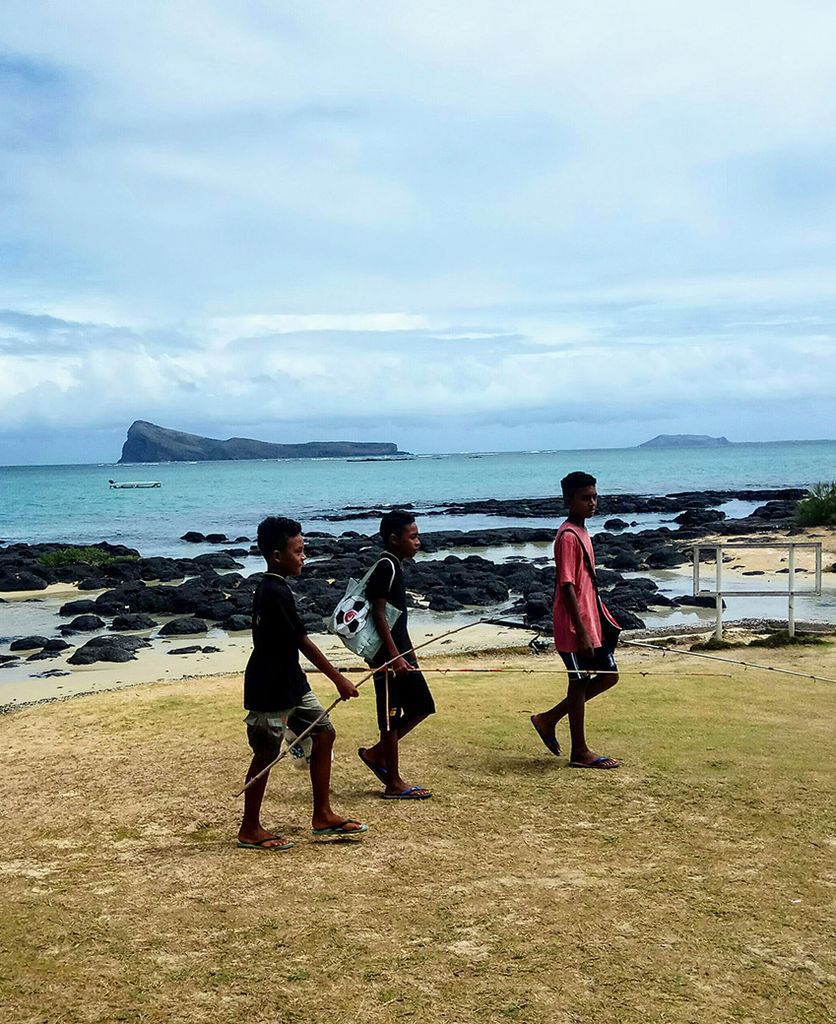 Niños en Cap Malheureux, Isla Mauricio