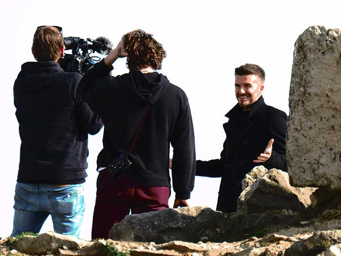 David Beckham durante una sesión de fotos juntoa su hijo