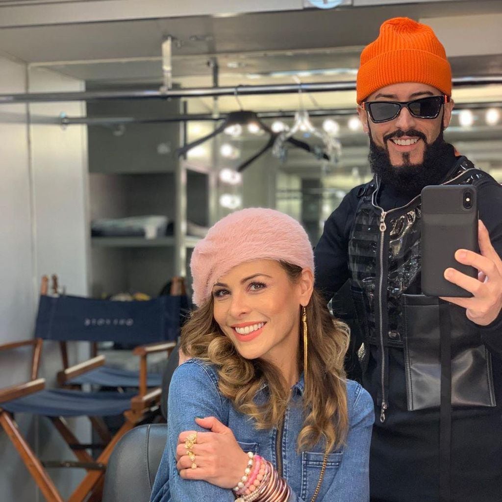 Yandel y su esposa