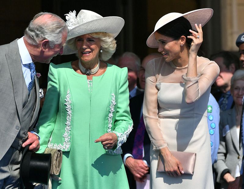 Meghan Markle con el rey Carlos y la reina consorte Camilla