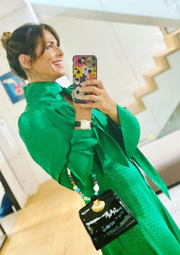 look de Nuria Roca con vestido verde