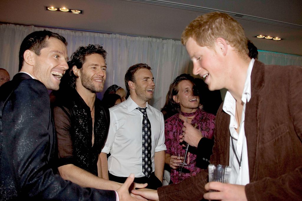 Harry in his meeting with Mark Owen, Jason Orange, Howard Donald and Gary Barlow, members of the legendary group Take That