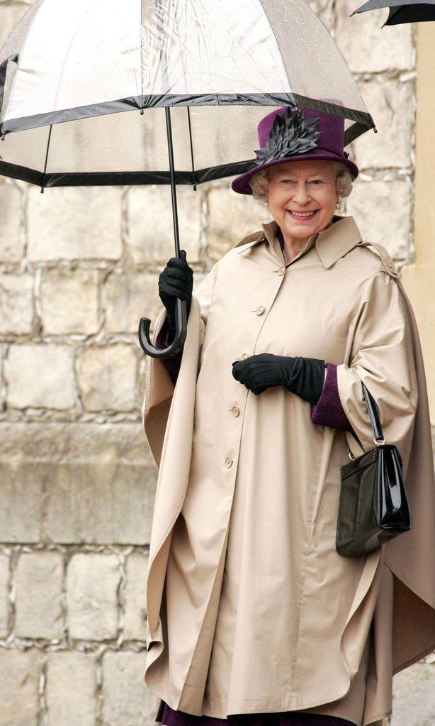 The Queen Watches A Parade Of Aston Martin Cars At Windsor Castle, On St.George\'S Day