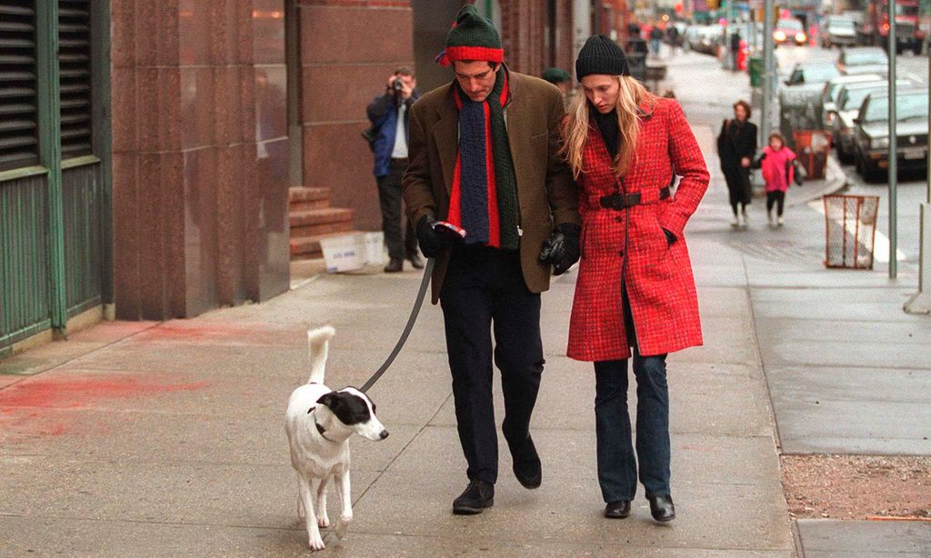 John F. Kennedy Jr. Walks with Wife