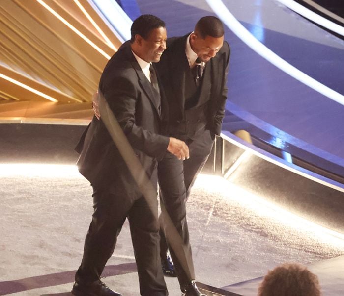 Denzel Washington consolando a Will Smith