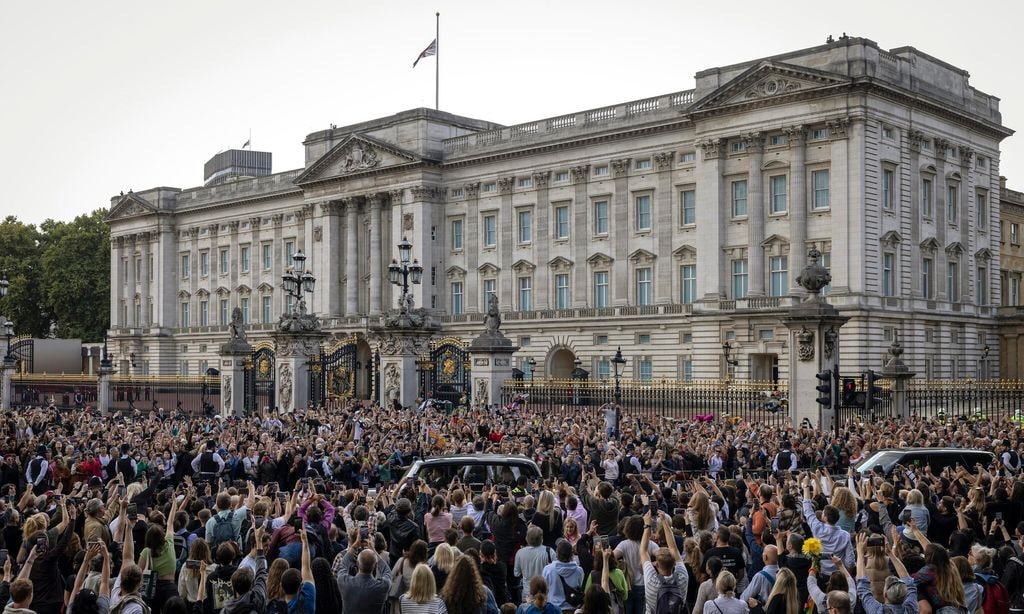 LONDON, ENGLAND - SEPTEMBER 09: The car carrying King Charles III and Camilla, Queen Consort arrives at Buckingham Palace with the Union Flag at half mast on September 9, 2022