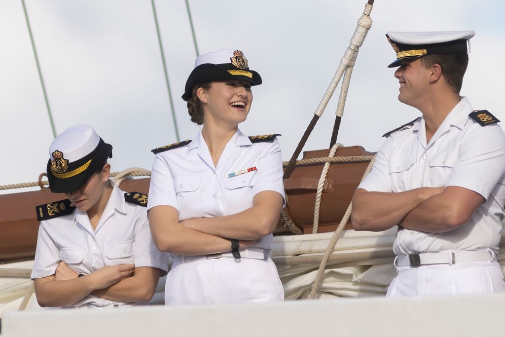 LAS PALMAS DE GRAN CANARIA, SPAIN - JANUARY 23: Crown Princess Leonor of Spain (C) stands with fellow crew members as they leave at Las Palmas de Gran Canaria port on January 23, 2025 in Las Palmas de Gran Canaria, Spain. Princess Leonor will take part in a training cruise as part of her military education, sailing on "Juan sebastian de Elcano" ship, alongside 76 midshipmen and visiting eight countries on a six-month journey covering over 17,000 nautical miles. (Photo by RubÃ©n GrimÃ³n/Getty Images)